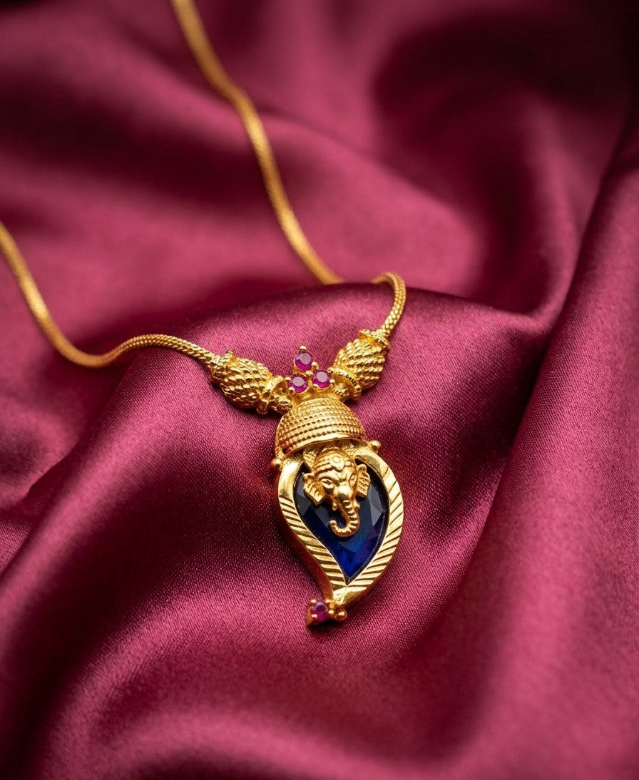 Traditional Handpicked Simple and elegance Ganesh pendant necklace with premium gold finish and royal detailing Jewellery.