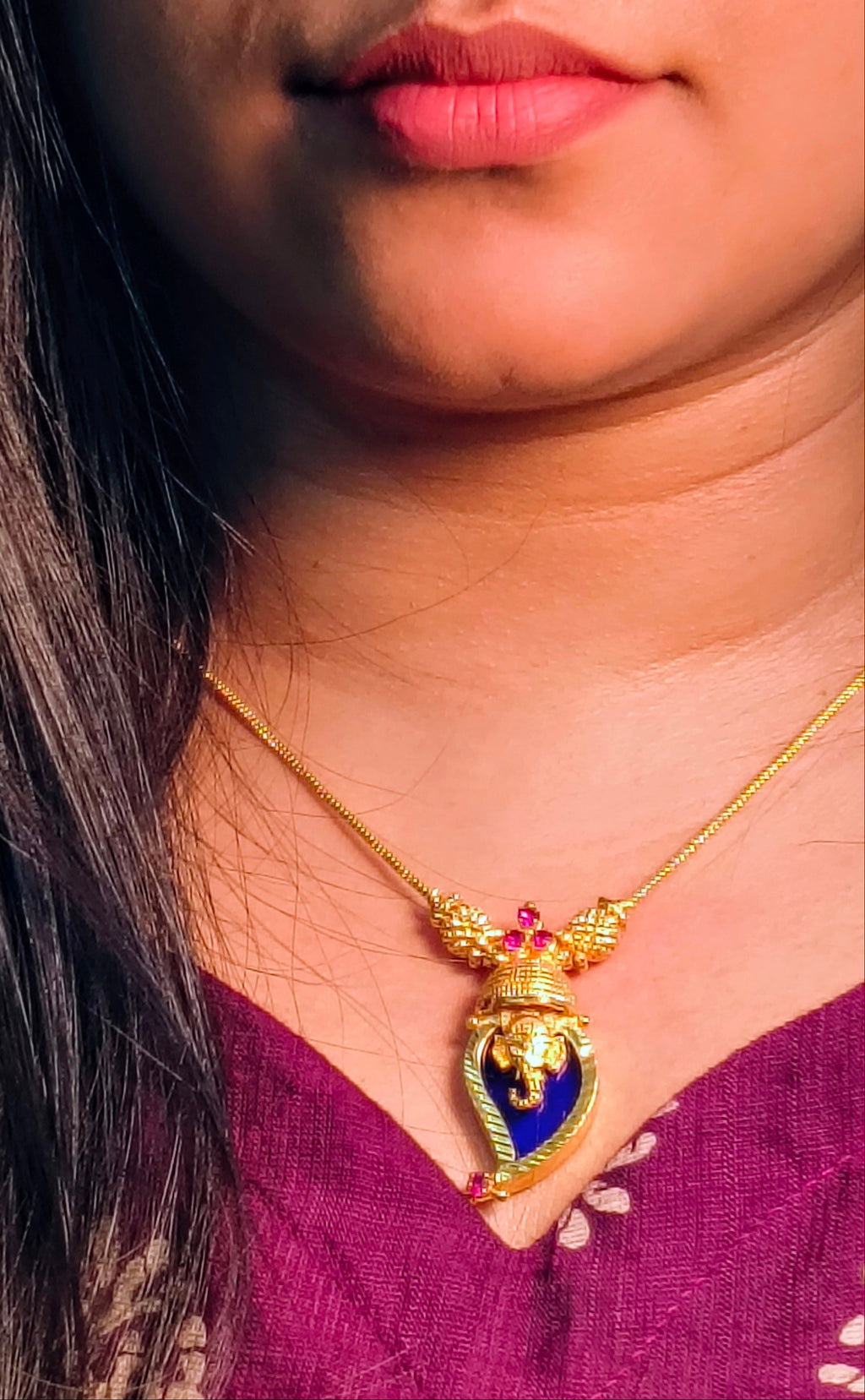 Traditional Handpicked Simple and elegance Ganesh pendant necklace with premium gold finish and royal detailing Jewellery.