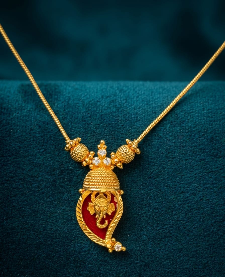 Traditional Handpicked Simple and elegance Ganesh pendant necklace with premium gold finish and royal detailing Jewellery.