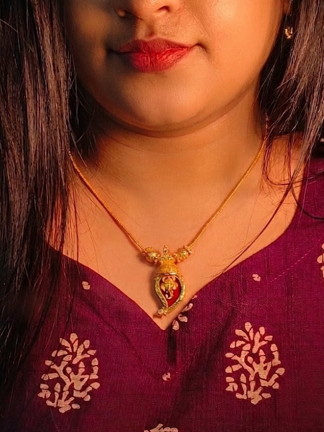 Traditional Handpicked Simple and elegance Ganesh pendant necklace with premium gold finish and royal detailing Jewellery.
