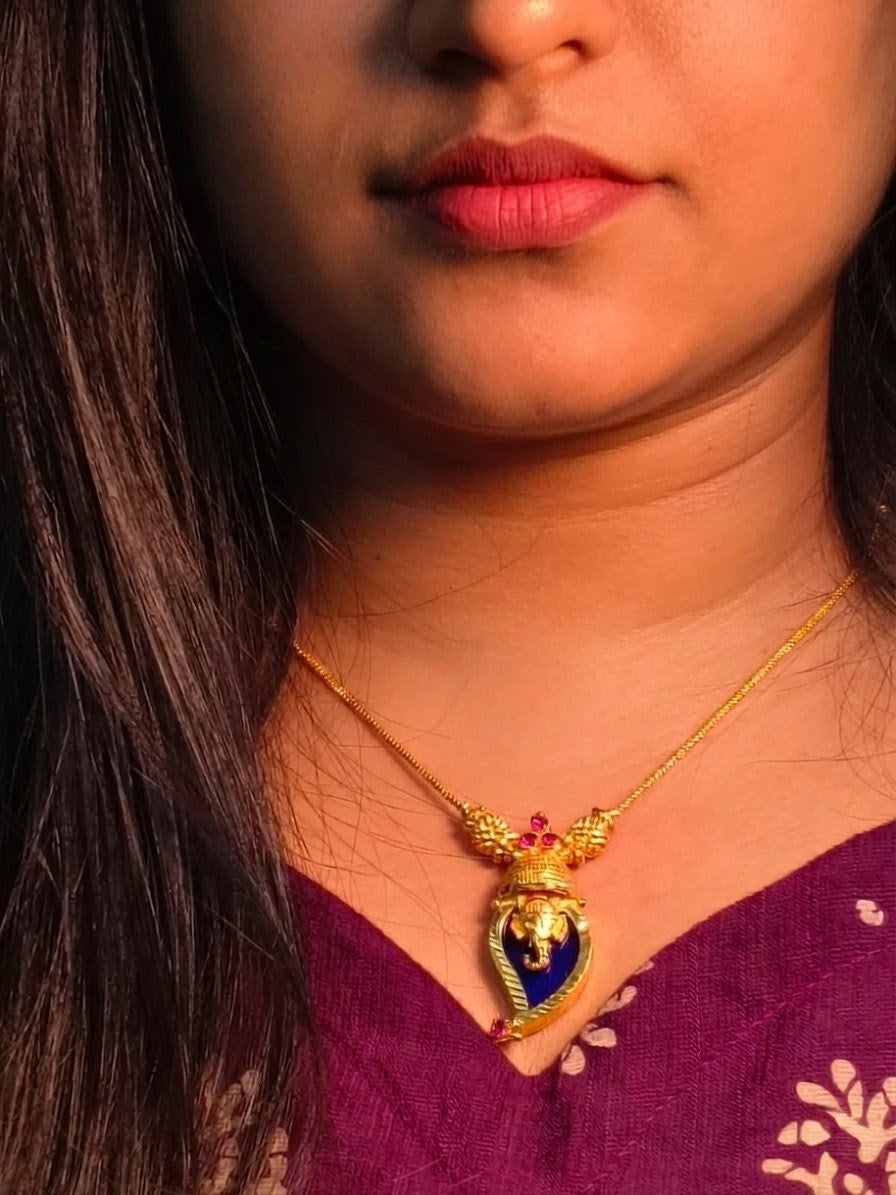 Traditional Handpicked Simple and elegance Ganesh pendant necklace with premium gold finish and royal detailing Jewellery.