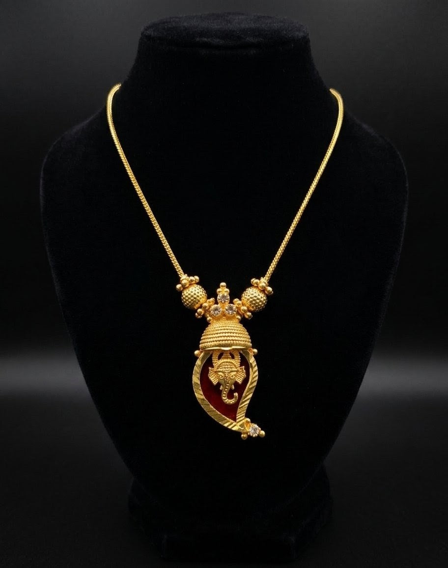 Traditional Handpicked Simple and elegance Ganesh pendant necklace with premium gold finish and royal detailing Jewellery.